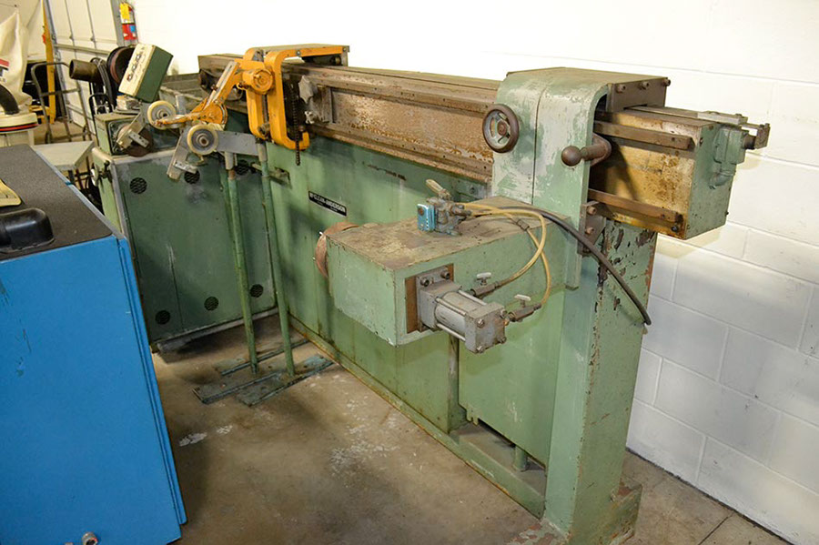 %_tempFileNametrison-machine-shop-auction063%